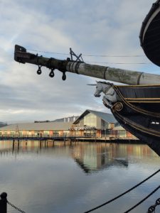 HMS Unicorn figurehead with Victoria Dock in the background